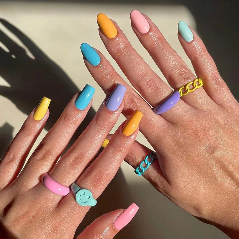 Artificial nail art with colorful designs Kalsten