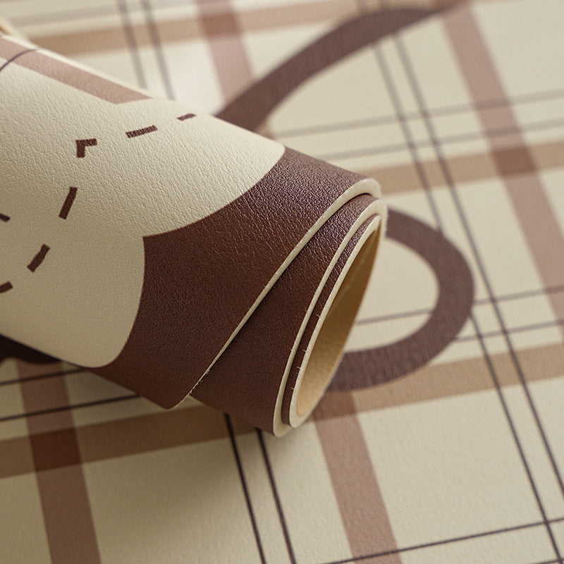 Rectangular table set placemat made of coated cotton mix with check pattern, decorative edge and bow motif