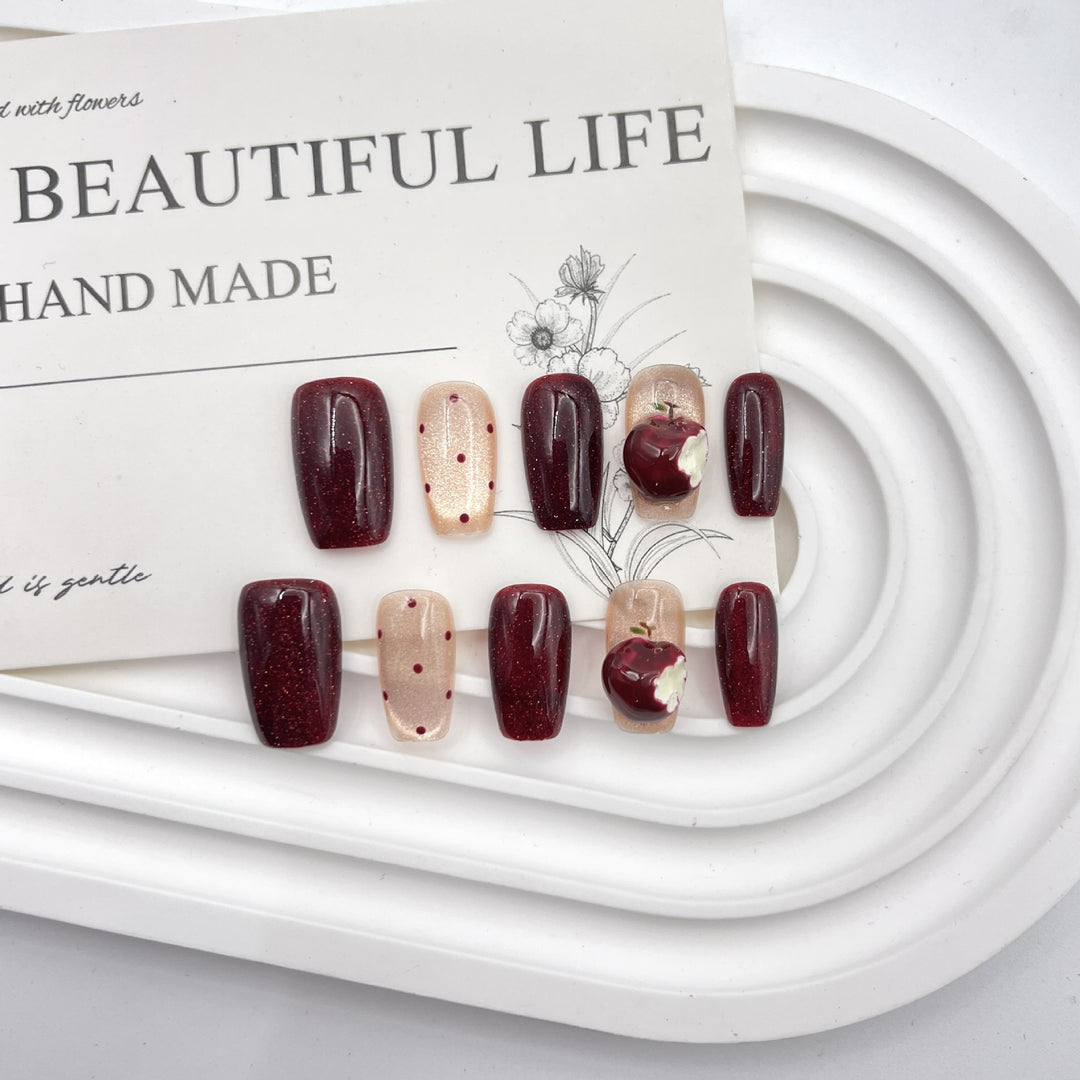 Artistic Press-On Nail Art Set with Creative Apple and Polka Dot Designs