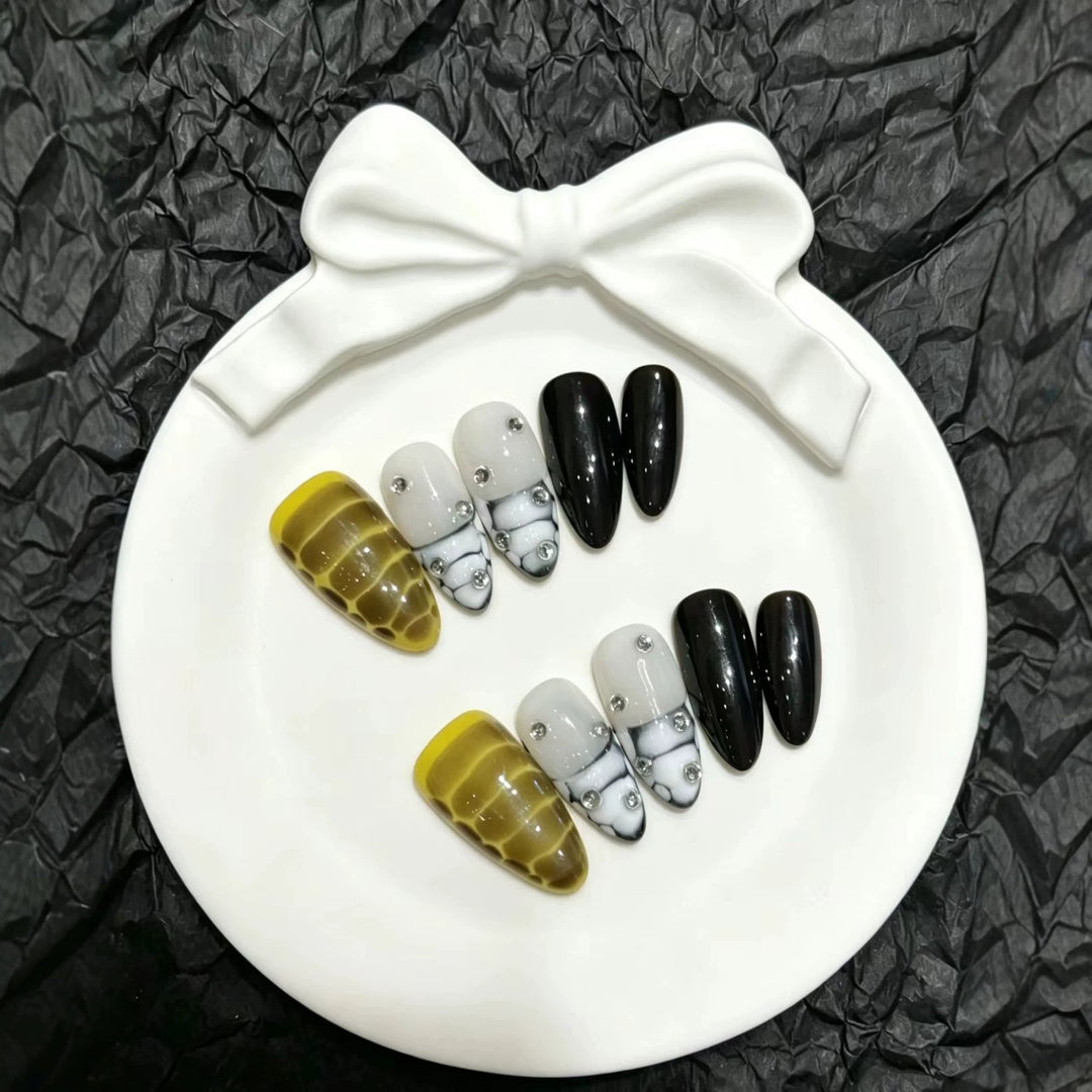 Artistic Press-On Nail Set with Decorative Gem Accents