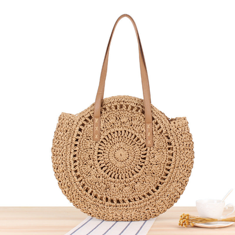Round straw bag with leather handles Kalsten