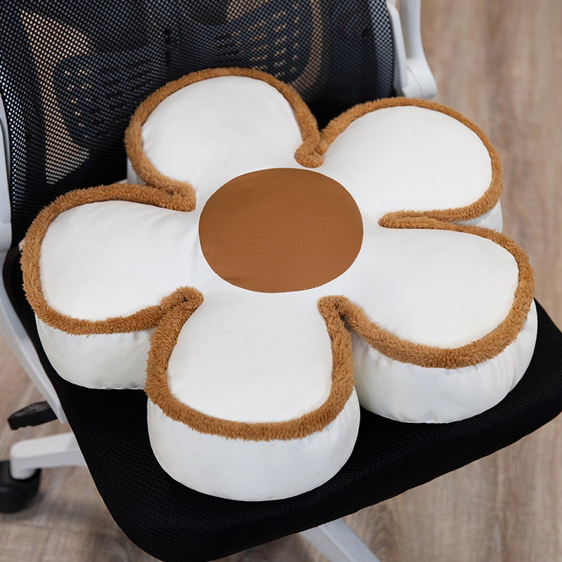 Padded seat cushion in flower shape with faux leather center piece and fluffy edge padding