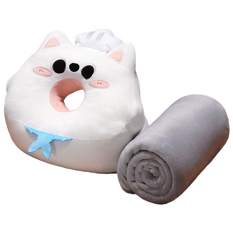 Ergonomic baby head pillow with center hole and cuddly blanket in cat plush design