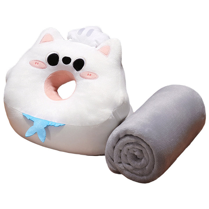 Ergonomic baby head pillow with center hole and cuddly blanket in cat plush design