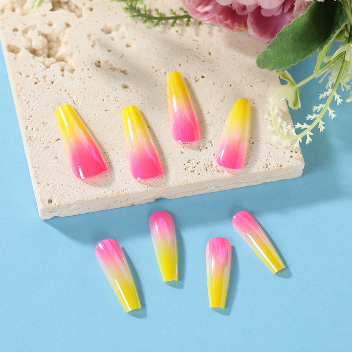 Artificial nail tips in modern ombre design Kalsten