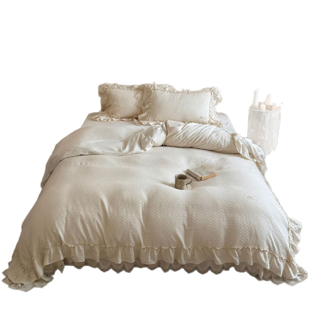 Bedding set in Shabby Chic with textured polka dot look, multi-layered ruffle, and lace finish