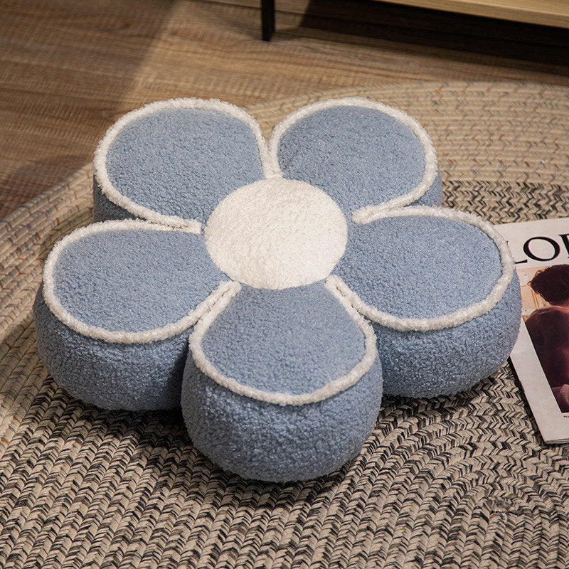 Padded seat cushion in flower shape with faux leather center piece and fluffy edge padding