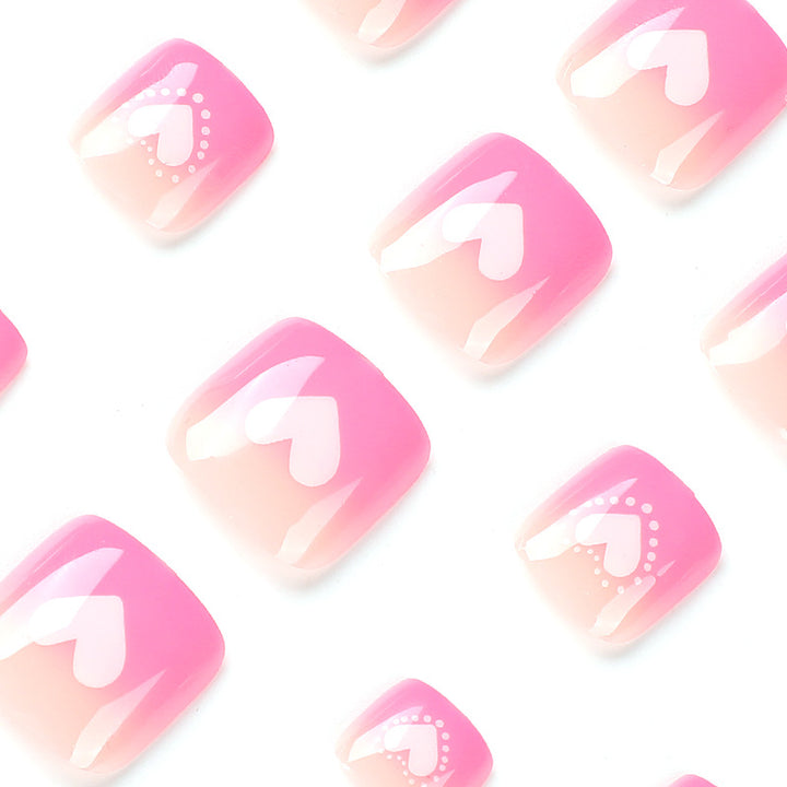 Artful toenail design with heart motifs Kalsten