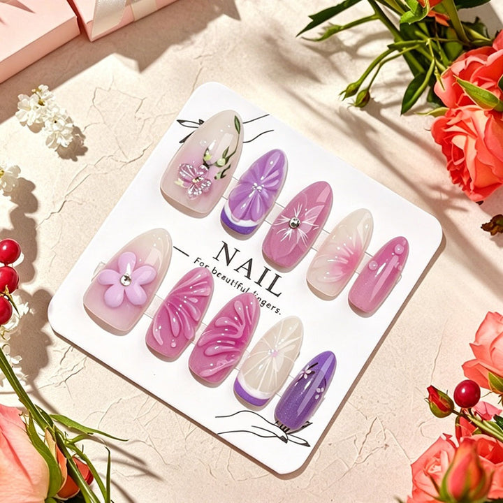 Decorative artificial nails with floral designs and glitter accents Kalsten