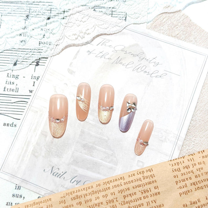 Glamorous artificial nails with rhinestone applications Kalsten