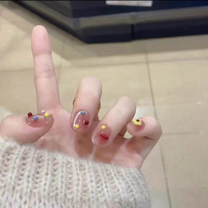 Artistic Press-On Nail Set with Floral and Glossy Accents Kalsten