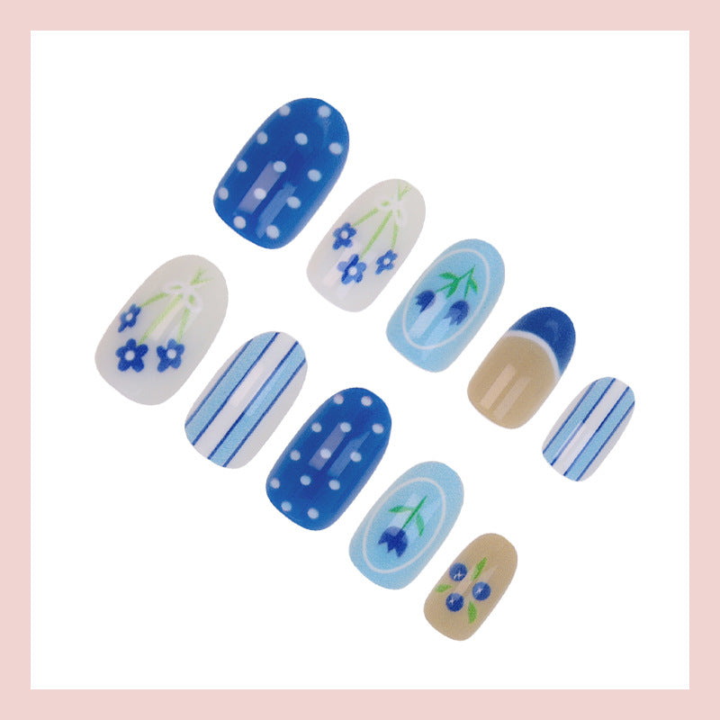 Nail art set with floral and striped designs Kalsten
