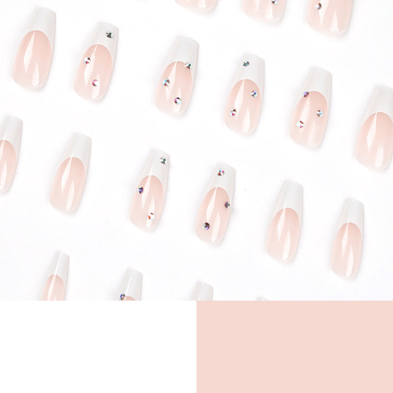 Artistic artificial nails in elegant French tip design with glitter accents Kalsten