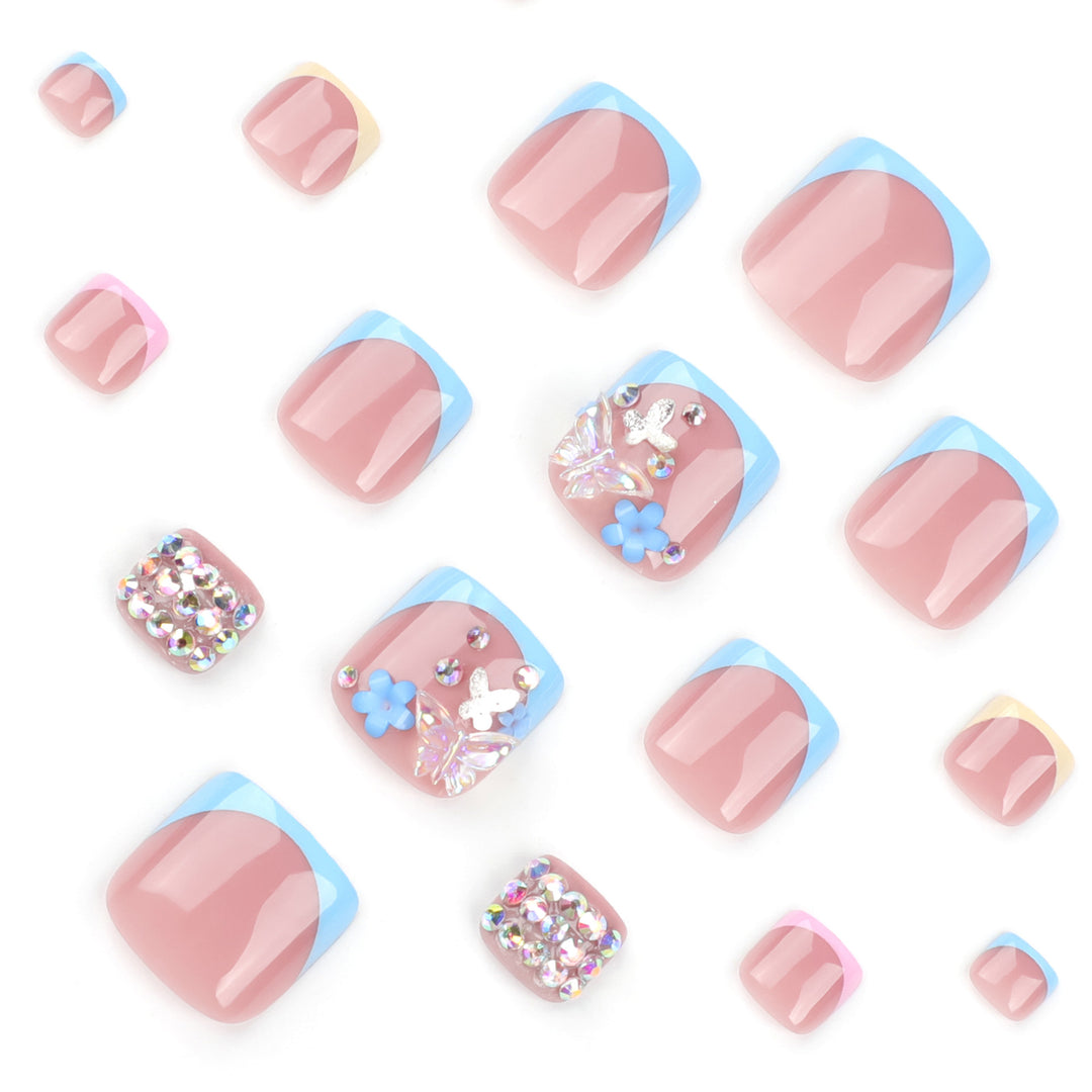 Artful toenail art with glitter and flower motifs Kalsten