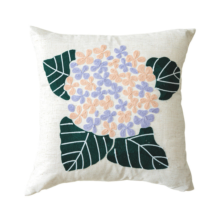 Square bouclé decorative cushion with tufted flower appliqué