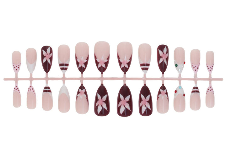 Artificial nail set with floral design and glitter accents Kalsten