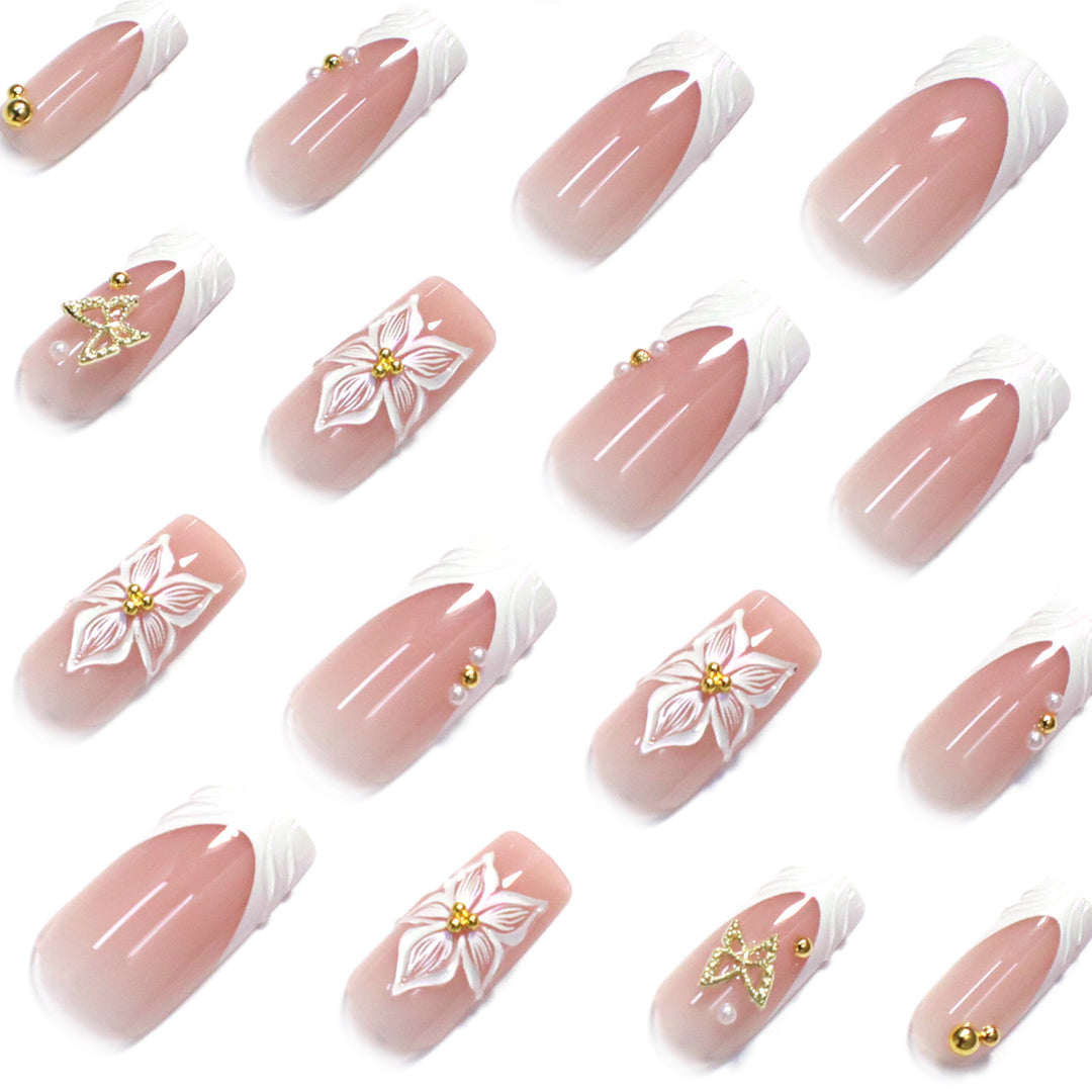 Elegant artificial nails with floral design and gold accents Kalsten
