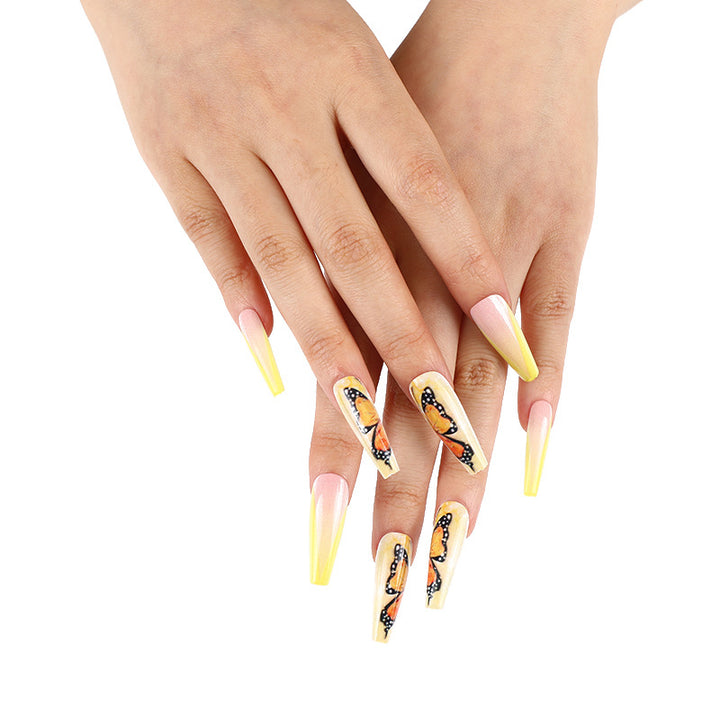 Art nails with butterfly motif Kalsten