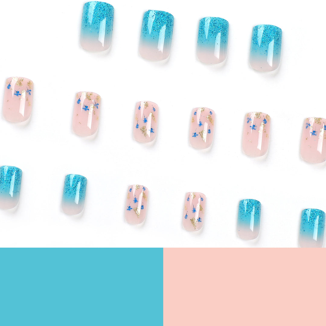 Artful acrylic nails with floral design and glitter effects Kalsten