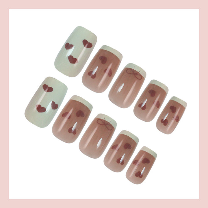 Artifical nails with romantic heart and ribbon designs Kalsten