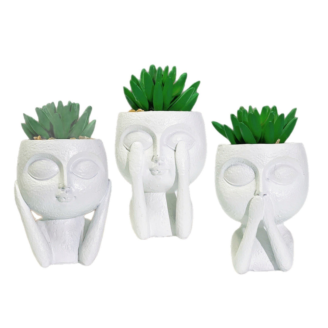 Plant pot with face motif Kalsten