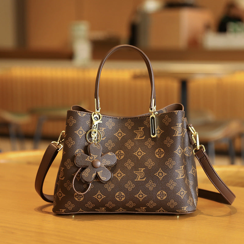 Elegant Handheld Tote Bag with Charming Floral Keychain