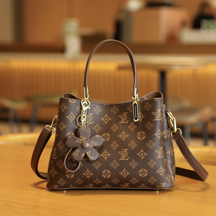Elegant Handheld Tote Bag with Charming Floral Keychain