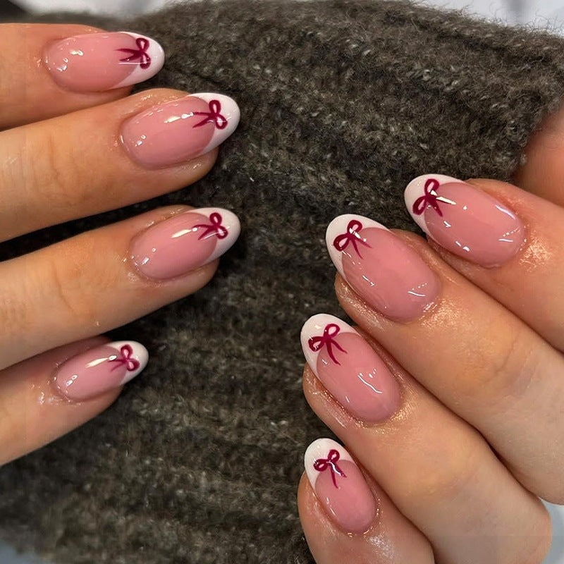 Nail art set with delicate bow designs Kalsten