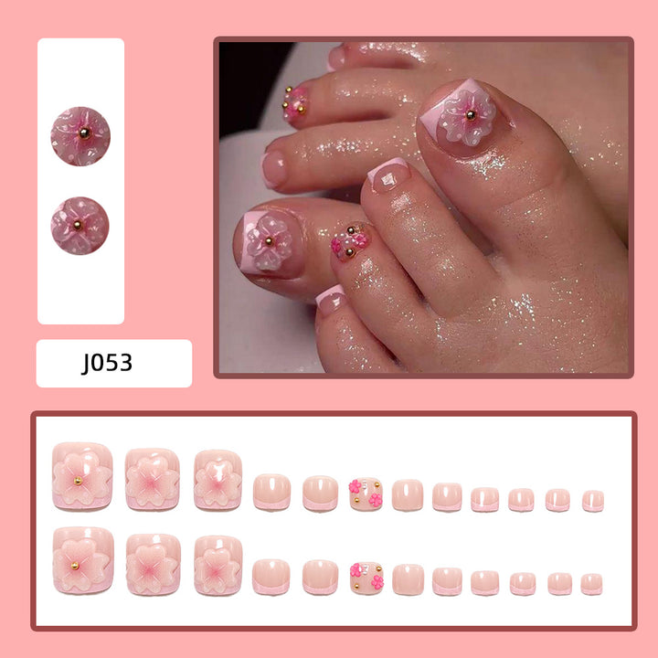 Artistic toenails with 3D flower appliqués Kalsten