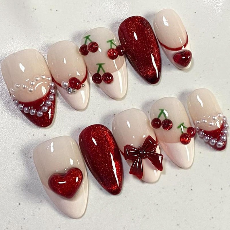 Artificial nail set with romantic heart design and sparkling accents Kalsten