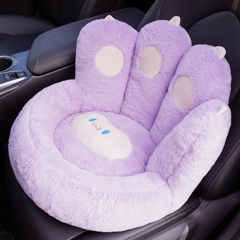 Cozy pet bed in paw design with raised edges and soft plush cover