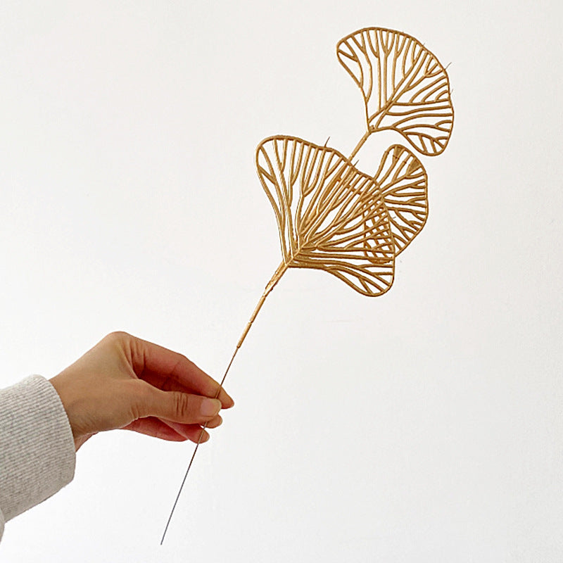 Decorative artificial flower branch with delicate details