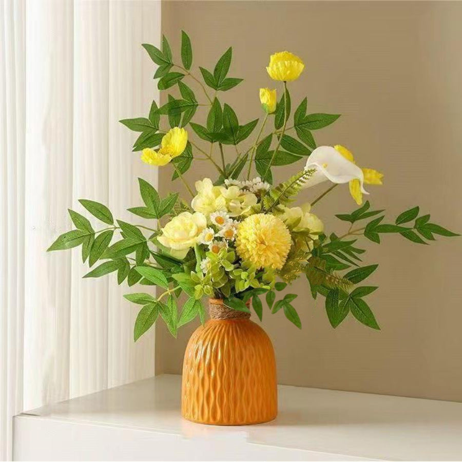 Elegant Floral Arrangement in Textured Vase