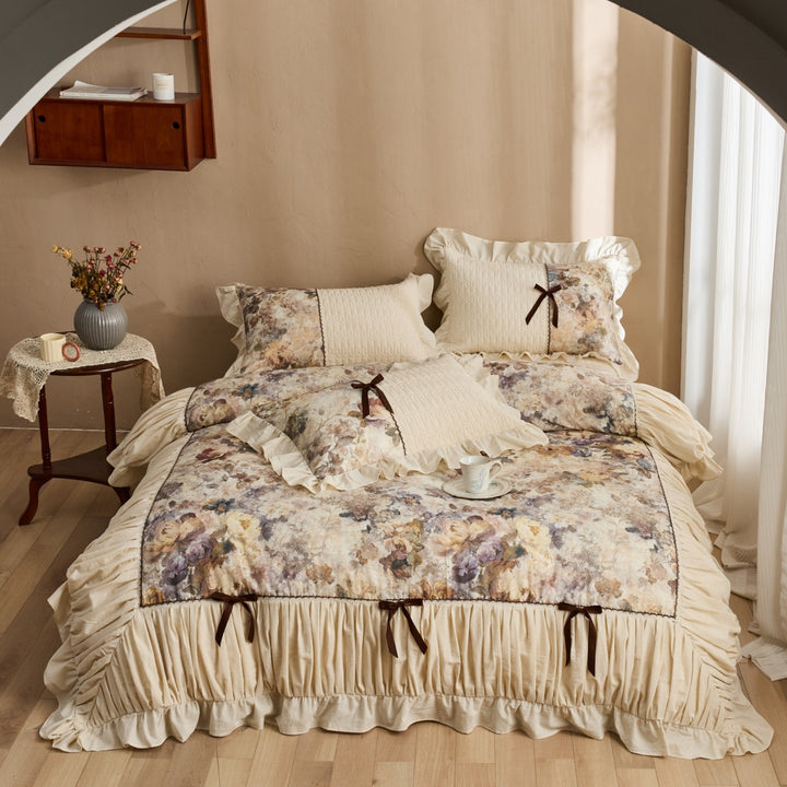 Romantic bedding set with frill, quilted panels and floral watercolor look