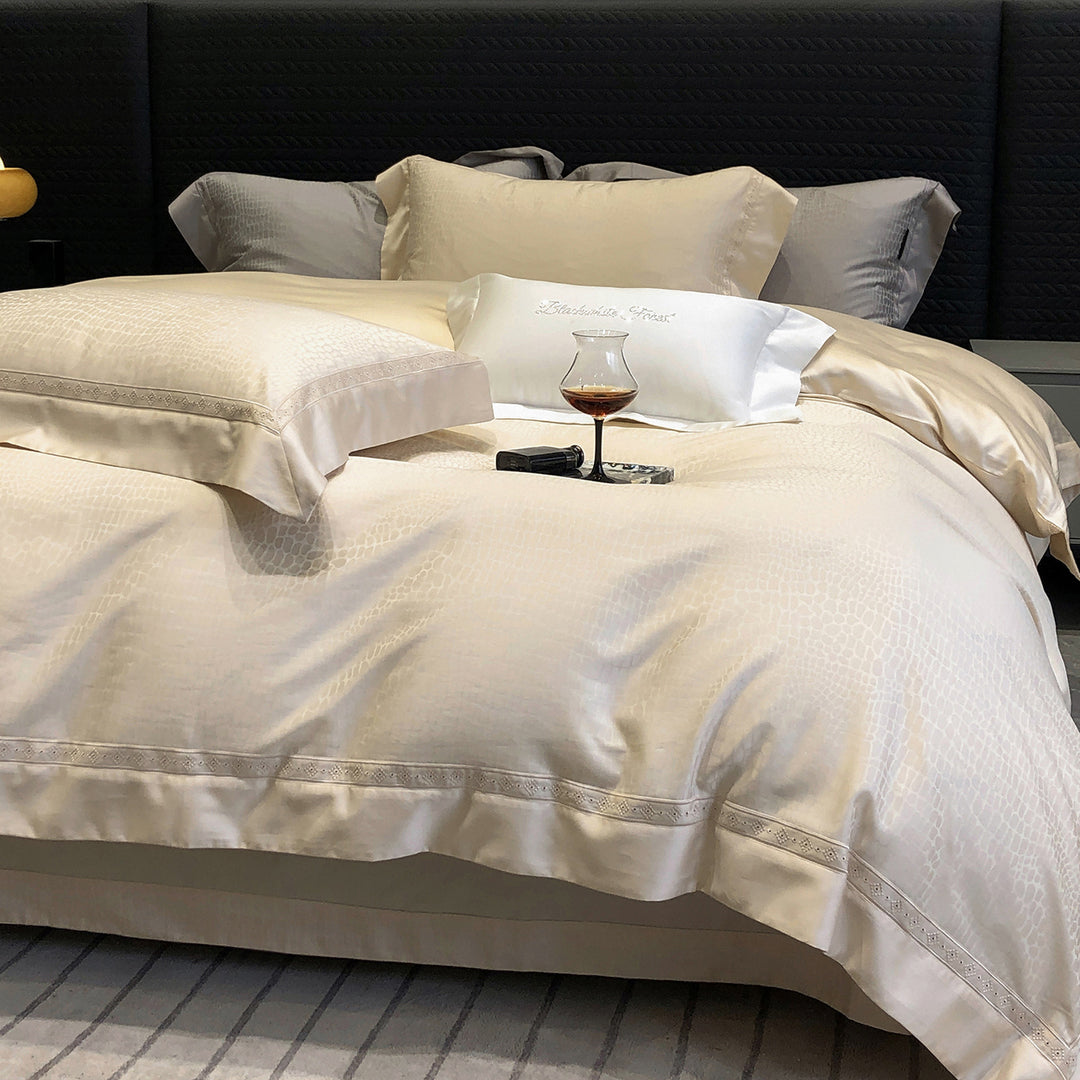 Premium cotton satin bedding set with structured matelassé border and hotel closure