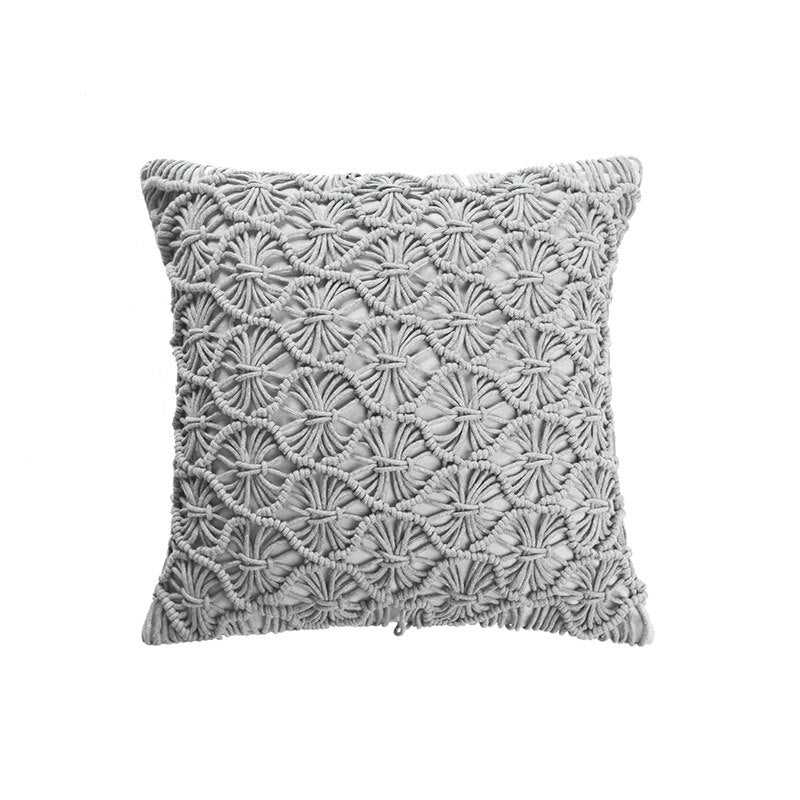 Rectangular cushion cover in macramé style with tufted floral appliqués and fringes