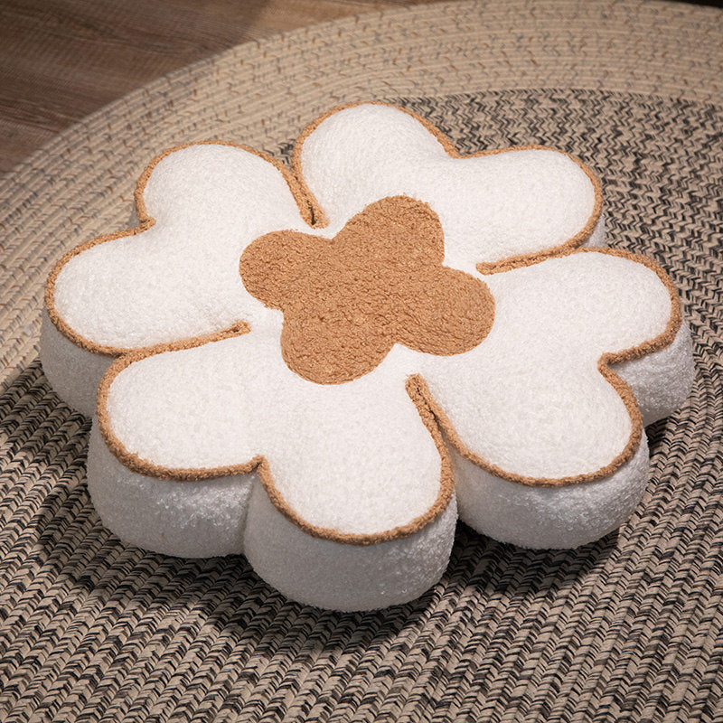Padded seat cushion in flower shape with faux leather center piece and fluffy edge padding