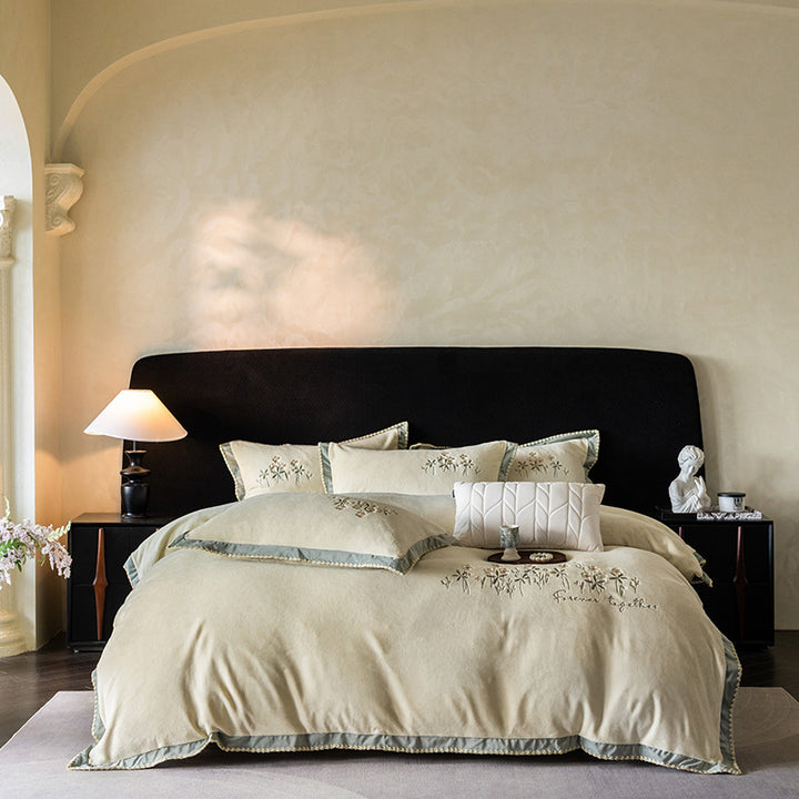 Premium cotton satin bed linen set with floral relief embroidery and satin trim