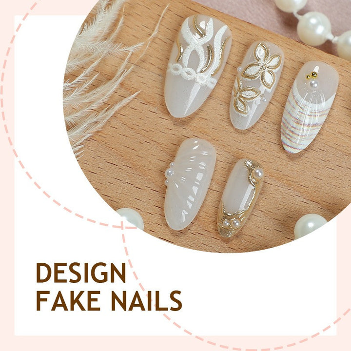 Artificial nail set with filigree gold accents and elegant designs Kalsten