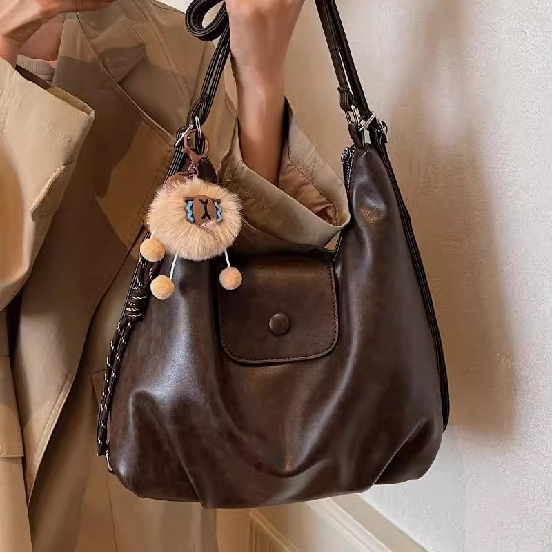 Modern shoulder bag with practical flap closure Kalsten