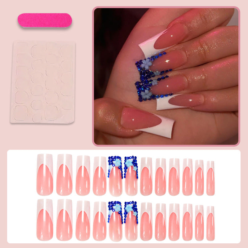 Artificial nail design with trendy blue accents and glitter coating Kalsten