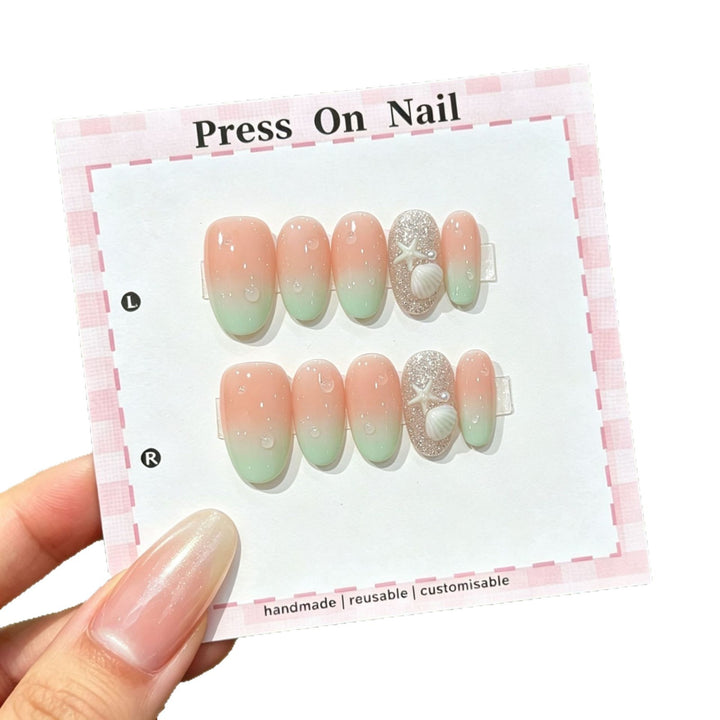 Artistic Press-On Nail Set with Shell and Star Accents
