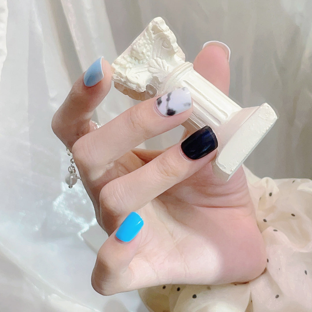 Artistic Press-On Nail Set with Marbled Patterns
