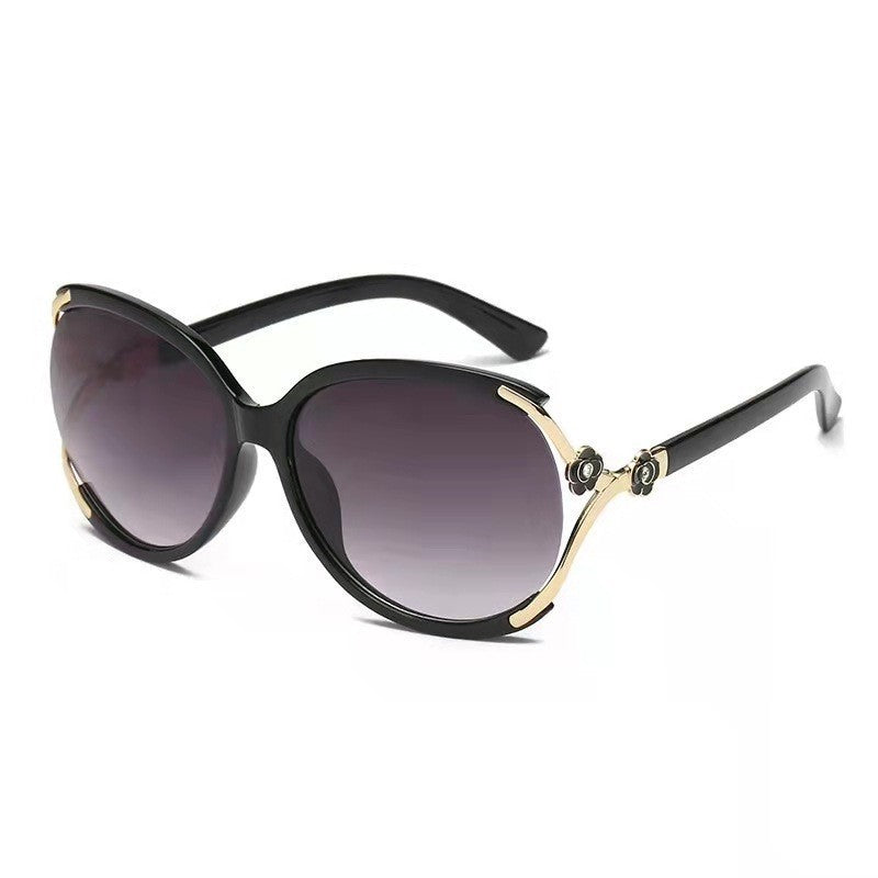 Ladies elegant oversized sunglasses with golden accents Kalsten