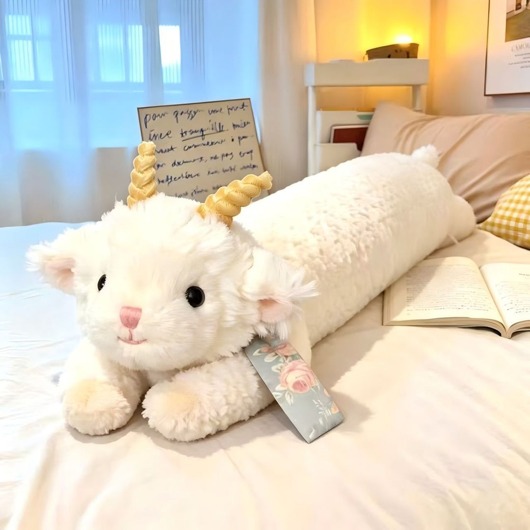 Cuddle roll pillow in sheep look with decorative horns