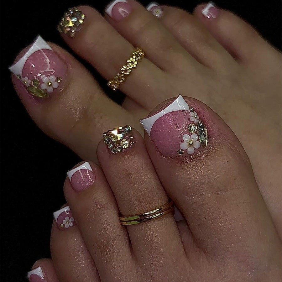 Acrylic nail set with elegant glitter and flower details Kalsten