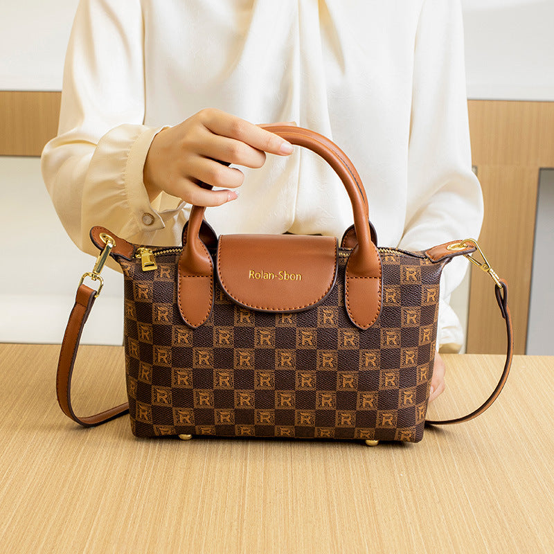 Elegant Designer Handbag with Structured Design
