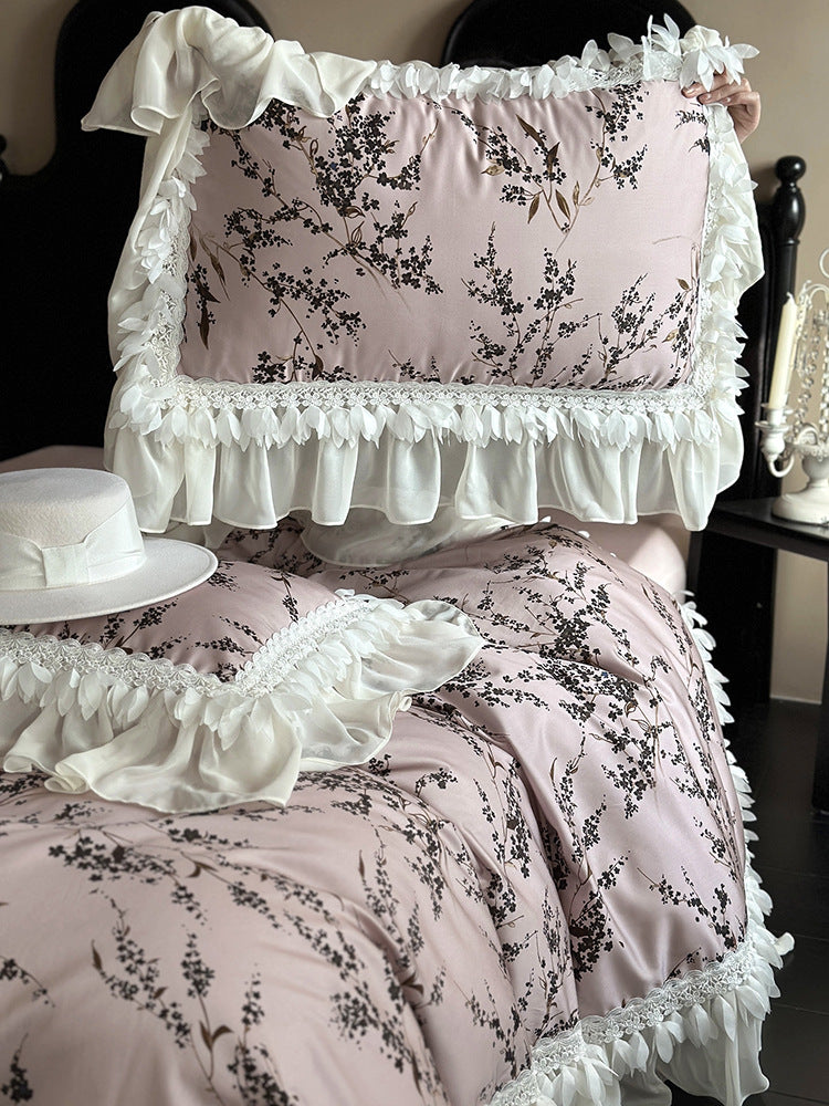 Satin bedding set with floral print duvet, tiered ruffle pillow & lace trim