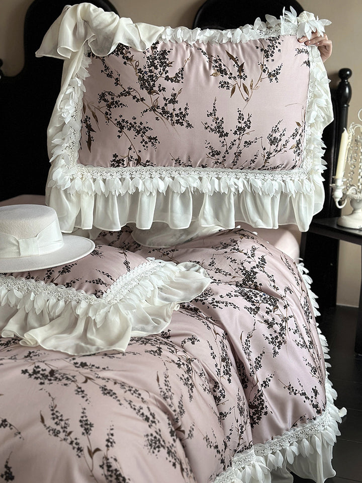 Satin bedding set with floral print duvet, tiered ruffle pillow & lace trim
