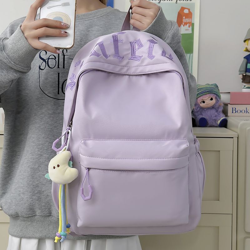 Fashionable backpack with removable charms Kalsten
